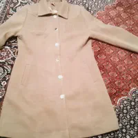 یک عدد مانتو کرمی