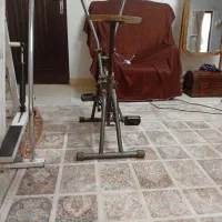 وسایل ورزشی دوچرخه ثابت ویک وسیله ی دیگه