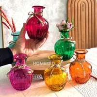 عرضه عمده گلدان‌های شیشه‌ای رنگی با قیمت همکاری|عمده‌فروشی|اصفهان, شهرک ولیعصر|دیوار