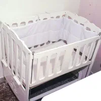 گهواره کنار تخت مادر