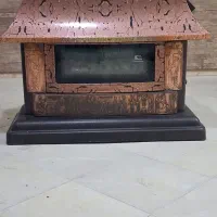 بخاری شومینه ومیز تلوزیون