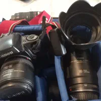 دوربین عکاسی حرفه ایCanon.qD100همراه ساک مخصوص ان