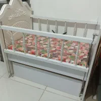 تخت نوزاد یا کودک کنار مادر