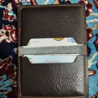 تعدادی زیادی کارت بانکی و کارت ملی