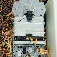 یک عدد آبگرمکن دیواری بوتان B3215درحد نو نو هست