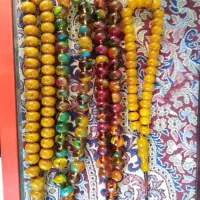 تسبیح شاه مقصود  و 33 عددی کهربا و سندلوس