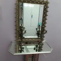 اینه و شمعدان برنجی