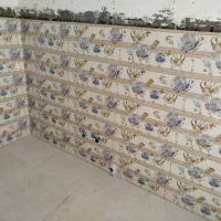 استاد کار سنگ کاری و کاشی کاری