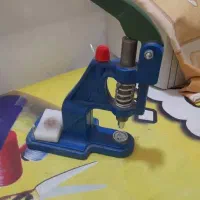 دستگاه پرس دکمه