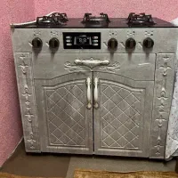 اجاق گاز صفحه شیشه ای پنج شعله کمد دار