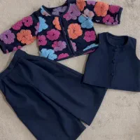 خیاط چرخکار  خانم ماهر مزون دوز لباس بچگانه