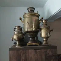 ۳ عدد سماورقدیمی.۱دست کت و شلوار مردانه.تخت نوزادی