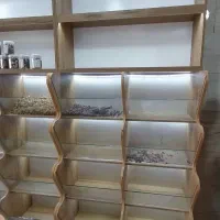 قفسه واستندآجیل وخشکبار تعدادی ال ایدی وتابلو