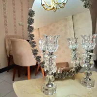 آینه و شمعدان به همراه میز