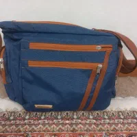 کیف وسایل نوزاد و آغوشی سوییسی
