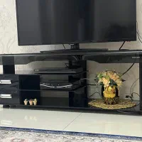 میز تلویزیون شیشه ای تک