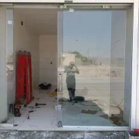درب شیشه‌ای سکوریت و اپراتور سکوریت