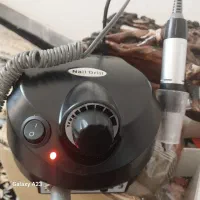 یک دستگاه مانیکور،  دستگاه  uv همراه تمام ابزار