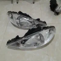 چراغ جلو پژو ۲۰۶ کبریتی RC درحد نو