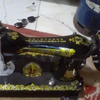 چرخ‌خیاطی‌قدیمی‌مردپرنده