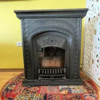 بخاری گازی چدنی طرح شومینه