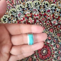 یک انگشتر مردانه فیروزه و یک انگشتر زنانه نقره