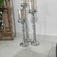 جا شمعی سه تایی کنار سالنی حباب دار