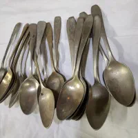 تعدادی قاشق و چنگال ورشو کوبه قالی