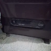 بخاری گازی و میز تحریر