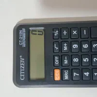 ماشین حساب جیبی همراه با کارتنش