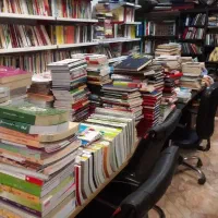 معامله کتاب کاغذ روزنامه کارتون