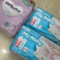 ۲ بسته پوشک مای بیبی و ۱ بسته جان ببه