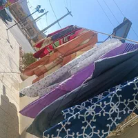 خشکشویی میخک صدرا بهمراه پیک رفت وبرگشت