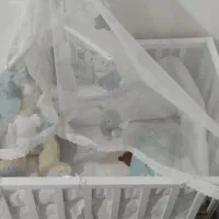تخت کنار مادر