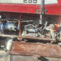 تراکتور با تریل و پنج گاز و گاو آهن و خرمنکوب