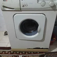 لباس شویی تاور