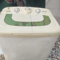 یک عدد لباسشویی