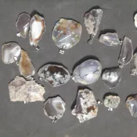 فروش نگین و گردنبند وسنگ راف به قیمت عمده|جواهرات|اصفهان, تخت فولاد|دیوار