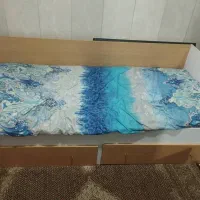 تخت خواب و دوچرخه