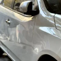 واکس و پولیش و احیای رنگ شیشه دودی