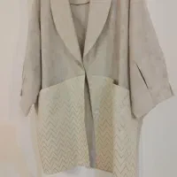 تعدادی مانتو و پالتو و کاپشن