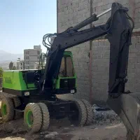 بیل مکانیکی لاستیکی اطلس ۱۳۰۴