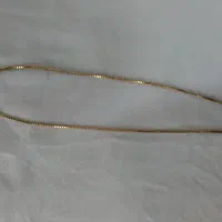 زنجیر طلا ۲۰۰ بالای تابلو