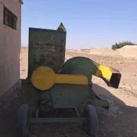 دستگاه خرمن کوب و بیل عقب تراکتور