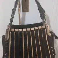 یک عدد کیف ورنی و کوله پشتی