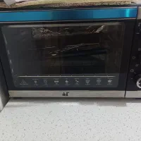 یک عدد استند گل و یک عدد توستر در حد نو و تمیز|اجاق گاز و لوازم برقی پختوپز|بندرعباس, |دیوار