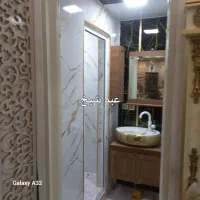 .نصاب.ماربل شیت مابین کابینت برچسبکابینت.پشت تی وی