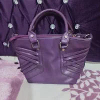 تعدادی کیف|کیف، کفش، کمربند|دورود, |دیوار