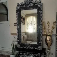 اینه وساعت  ایستاده