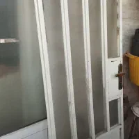 یک قواره پارچه.درب آهنی کاملا سالم همراه بادستگیره